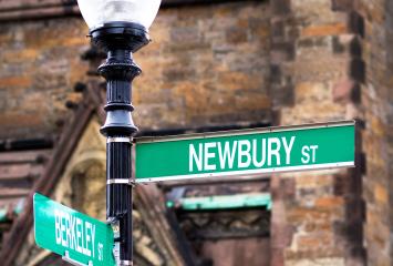 Newbury St and Berkley St corner street signs