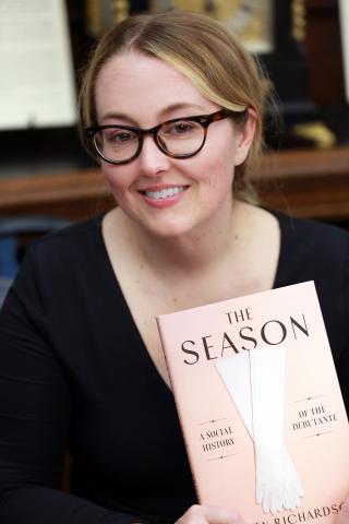 Kristen Richardson poses with The Season book