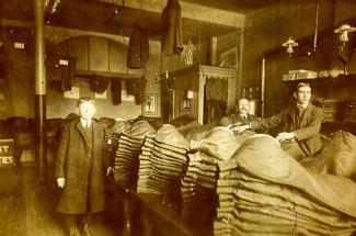 video-library-shalom-salem.jpg Black and white photograph of two men in a large room