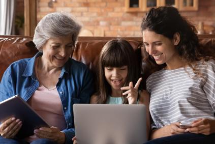 grandmother, daughter, and grandchild talking 